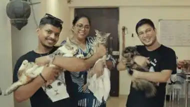 Sawan Koull Fulfills Year-Old Promise, Distributes 100 Kg of Cat Food to Honour Rescue Cat Laxmi’s Recovery